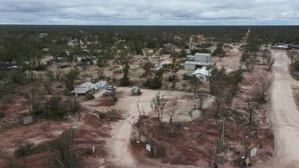 A revealing aerial video show small mining homes and roads in the outback Australian town of Lightni