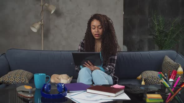 Businesswoman in Headset Receiving Orders Indoors