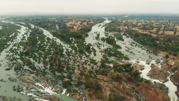 Aerial: flying over Don Det and the 4000 islands Mekong River in Laos