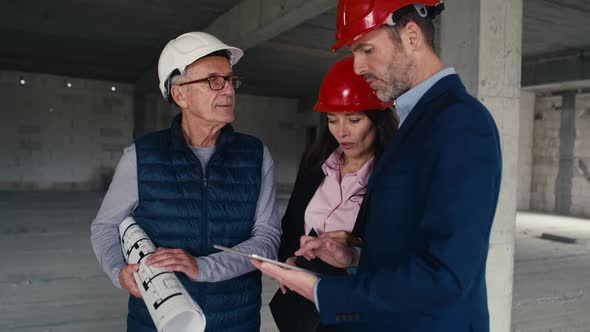 Medium shot  footage of group of  caucasian engineers