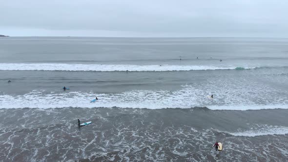 Surf training, Pacific Ocean (La Serena, Chile) aerial view, drone footage