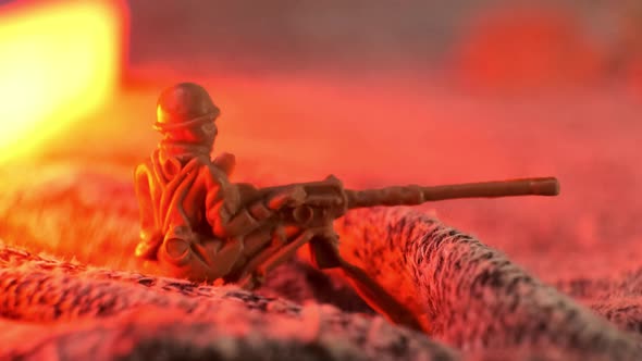 Toy Soldier Machine Gunner in an Imaginary Trench with Flashing Red Light