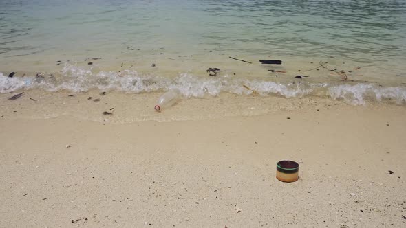 Single Use Plastic Bottle Floating on Ocean Sea Water at Beach, Rubbish Garbage Trash and Waste Caus