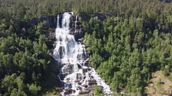 Famous tourist attraction Tvindefossen waterfall - Voss Norway aerial