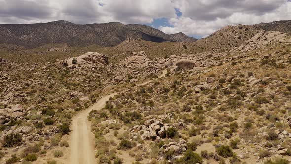 Aerial shot of interesting rock formations in the desert of California