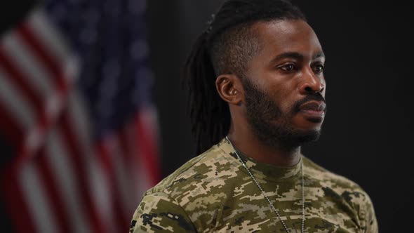 Unshaved Confident Serious African American Soldier Looking Away and Turning to Camera