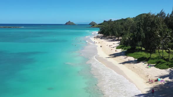 Drown shot flying over Kailua Beach on Oahu Hawaii towards the mokes in Lanikai