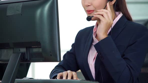 Business People Wearing Headset Working in Office