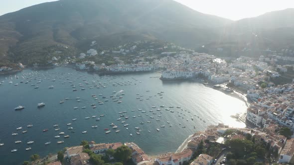 Drone Flight Over Bay of Town Cadaques at Sunset