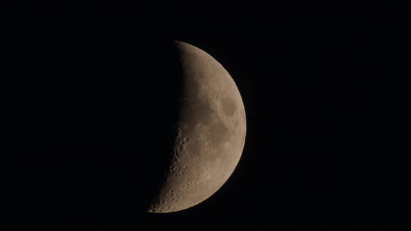 Natural Night Background with Dark Sky and Half Moon, Earth Satellite. Waxing Gibbous Phase.