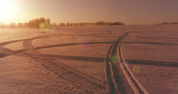 Aerial Drone View of Cold Winter Landscape with Arctic Field, Trees Covered with Frost Snow 