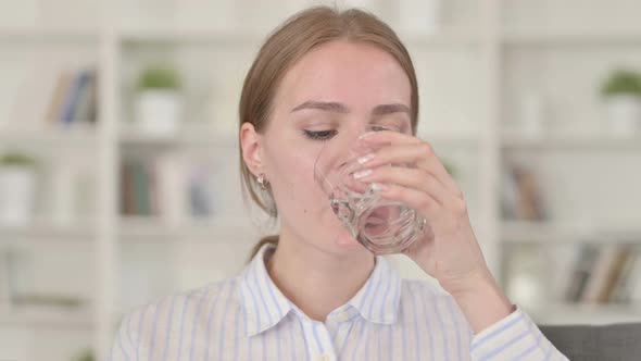 Beautiful Young Woman Drinking Water, Taking Sip