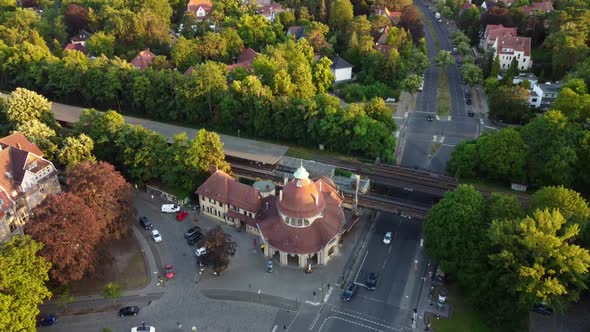 town villas area around the train stationGreat aerial view flight tilt up drone footage of mexikopl