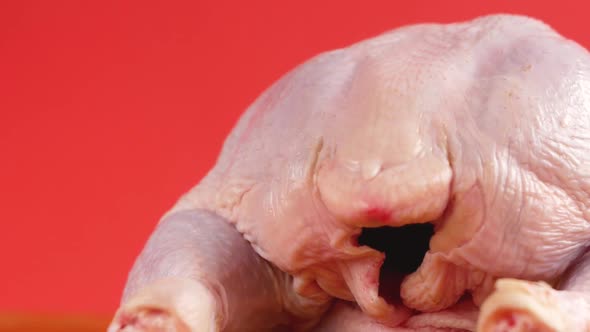 Raw dietary chicken meat close-up rotates.