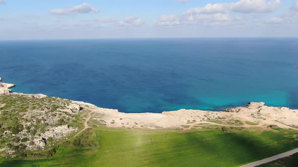 Drone View of Cyprus Green Valley on Mediterranean Sea Coastline. Aerial Wide Shot of Deserted Sandy