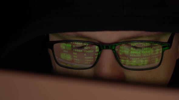 Closeup Hacker or Spy Hacking the Network