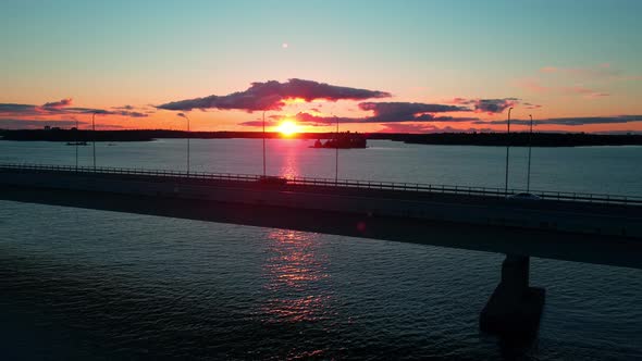 Aerial view of traffic on the Lapinlahti bridge, in Helsinki, summer sunset in Finland