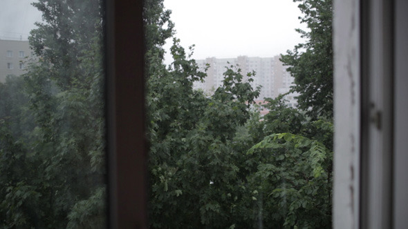 Heavy Rain Focus Pulling From Window To Building alt