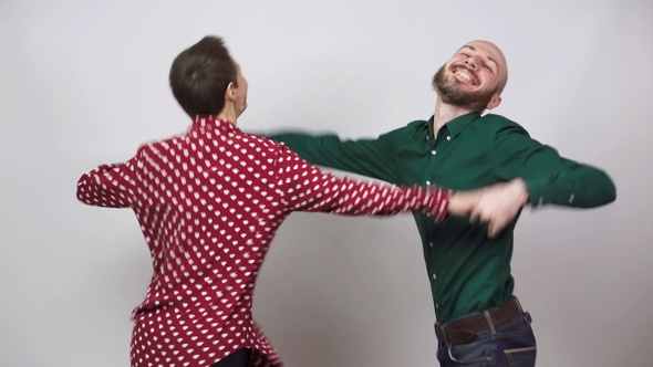 Swing dancers on white background. Man and woman are dancing