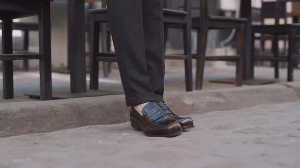 Feet of Businessman Commuting to Work