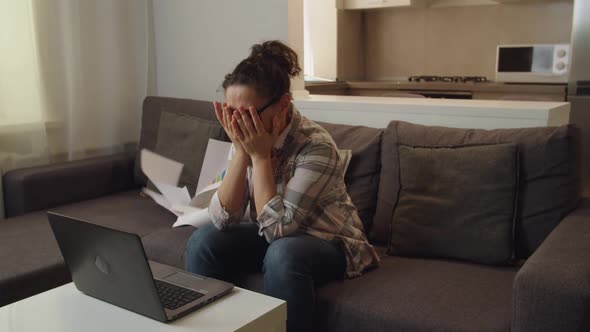 Moving Shot of Tired Adult Female Experiencing Mental Distress at Home