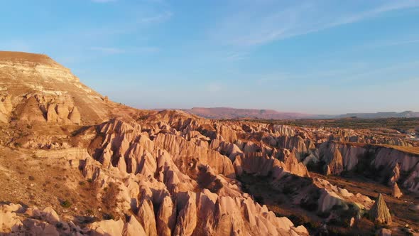 Cappadocia Aerial Drone View To Sunset Red and Rose Valley Rocks, Goreme Turkey