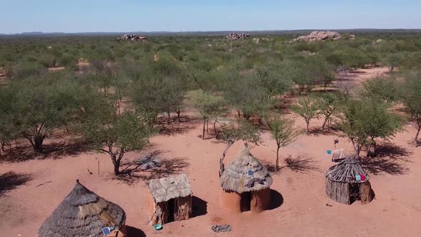 The village of the native tribe Himba in Namibia and the view on the forest