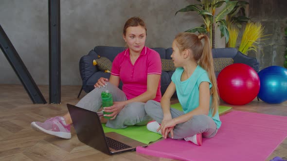 Motivated Family Preparing for Indoor Online Workout