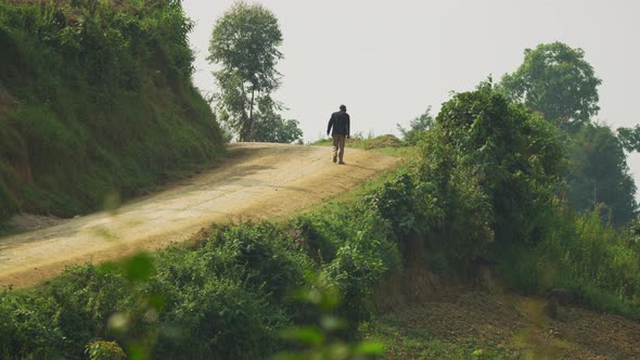 Man walking on a road