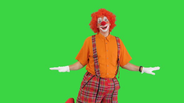 Male Clown Waving His Hands Like He Is Flying on a Green Screen Chroma Key