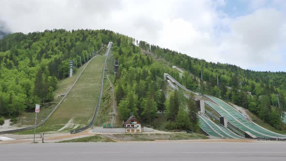 One of the biggest ski jump in the world at Planica in Slovenia in the summertime with lots of trees