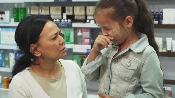 Mom Looks Very Worried Because Her Daughter Sneezed