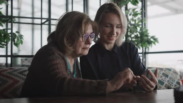 Mother and Daughter Met in a Restaurant