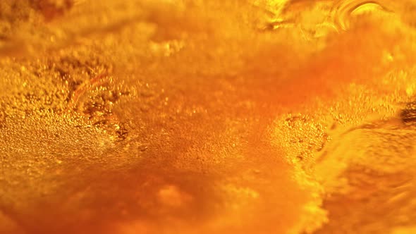 Super Slow Motion Shot of Abstract Beer Background at 1000Fps