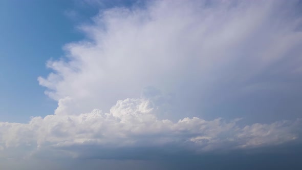 Bright Landscape of White Puffy Cumulus Clouds on Blue Clear Sky