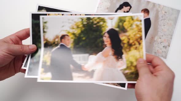 Printed on Paper Photos of the Bride and Groom