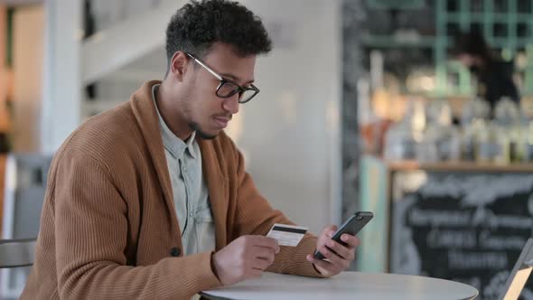 Online Shopping Failure on Smartphone By African Man