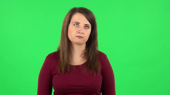 Portrait of Pretty Girl Focused Thinking About Something, No Idea. Green Screen