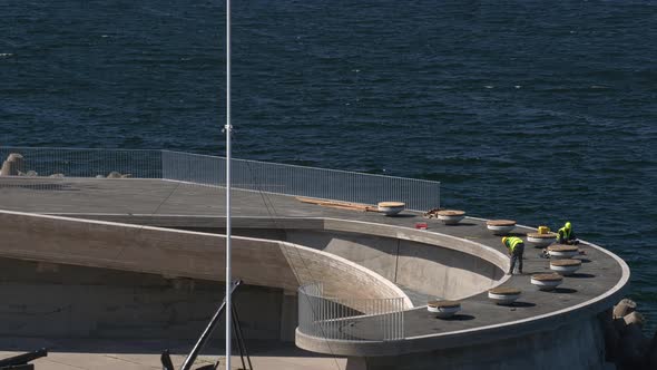 Beautiful Shot of Workers Reconstructing the Harbor of Tallinn