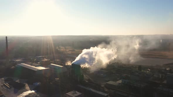 Aerial Shot of Smoke Pouring From Chemical Factory Into Atmosphere