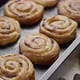 Fresh Baked Cinnamon Buns on Black Iron Tray - VideoHive Item for Sale