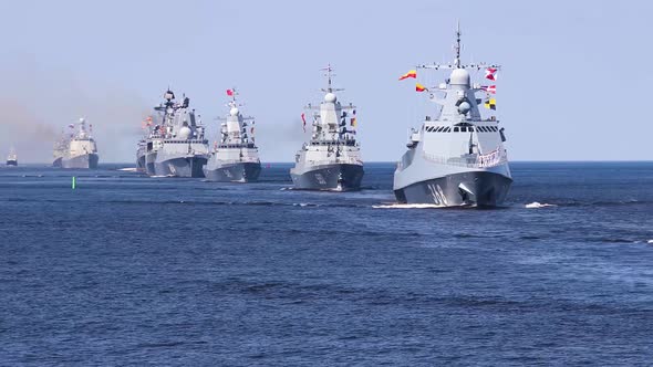 A line ahead of modern russian military naval battleships warships in the row