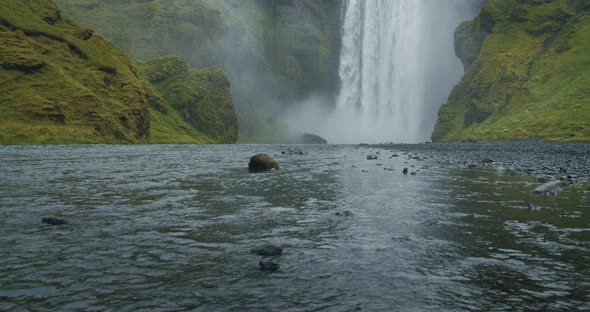 Beautiful Skogafoss Waterfall with River Reflection in Iceland