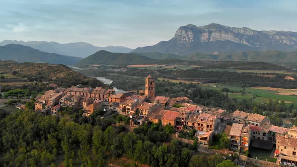 Aerial Sunset View of Ainsa - Mountain Village in Aragon Mountains, Spain