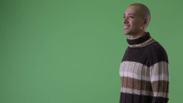 Profile View of Happy Bald Multi Ethnic Man Thinking Ready for Winter