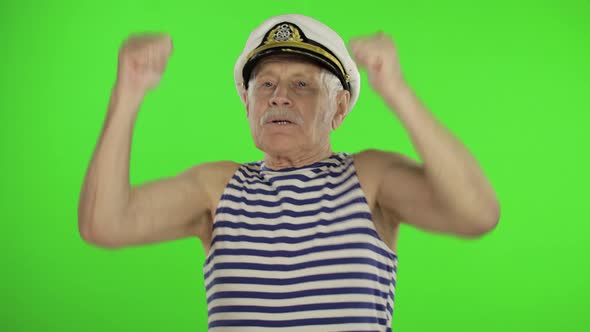 Elderly Sailor Man Funny Dances. Old Sailorman on Chroma Key Background