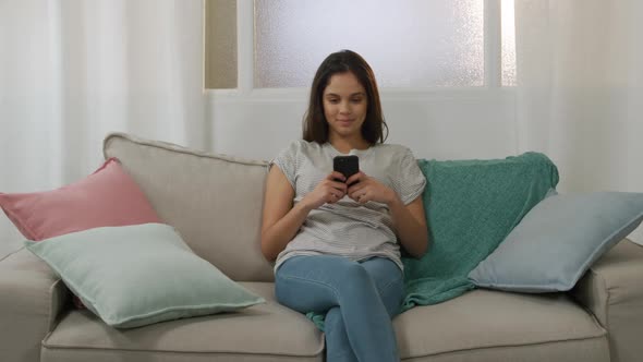 Caucasian woman using her phone