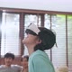 asian family son wear VR or virtual reality glasses - VideoHive Item for Sale