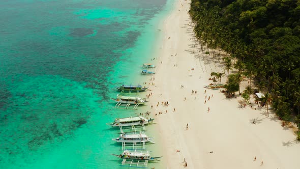 Tropical Beach and Turquoise Lagoon Water