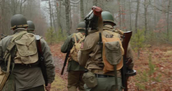 Historical Re-enactment. Re-enactors Dressed As American Soldiers Of USA Infantry Of World War II